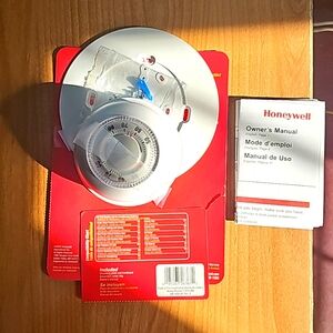 Round white thermostat